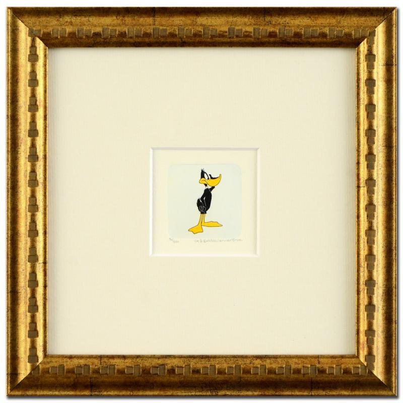 "Daffy Duck" Framed Limited Edition Etching with: "Daffy Duck (Looking to the Side)" is a limited edition etching on paper with hand-tinted coloring from Warner Bros. (dated 1999) and numbered! This piece comes framed. Measures approx. 9" x 9" (with 
