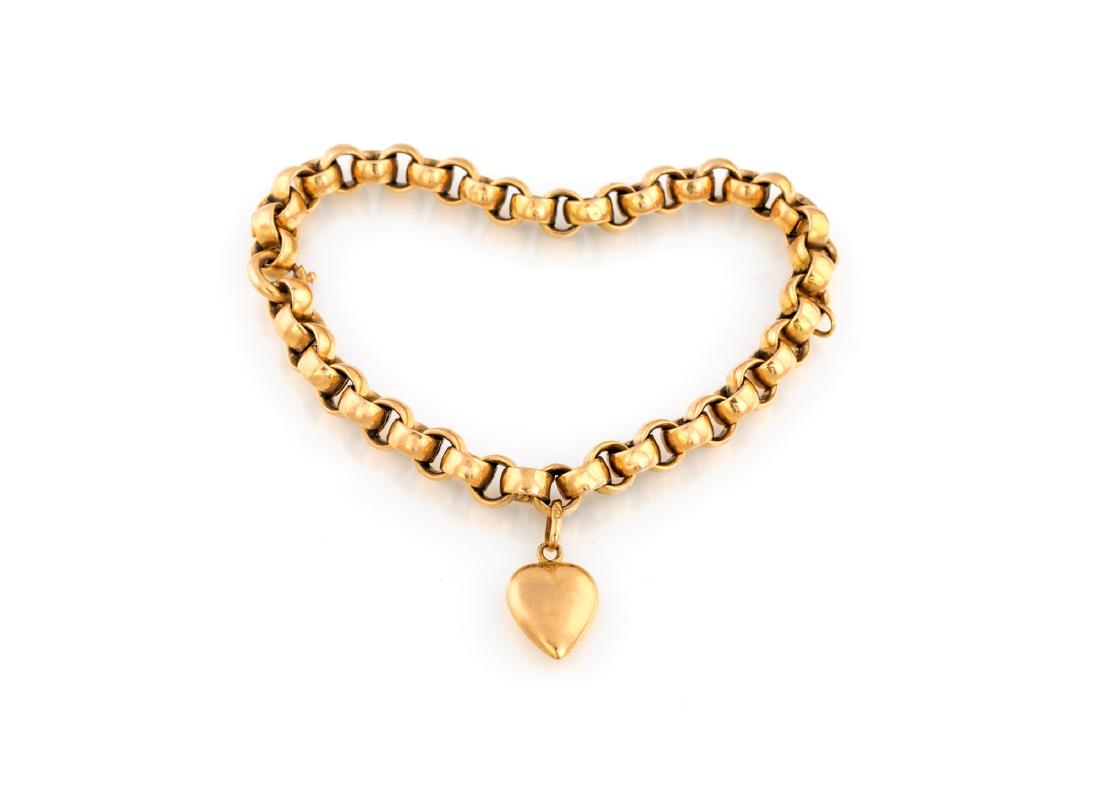 BRACELET: in yellow gold 750/000 rollo sweater with heart pendant, 10.90 g.