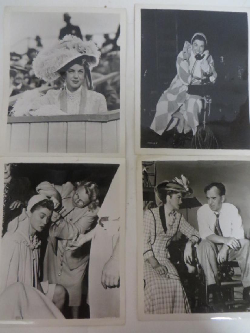 Esther Williams Movie Stills and Publicity Photographs: Set chat with Director Bobby Berleley on the set of "Take Me Out to the Ball Game", publicity snipe on the back;' and three others all from the same movie, all with publicity snipes at the back 8" x 1