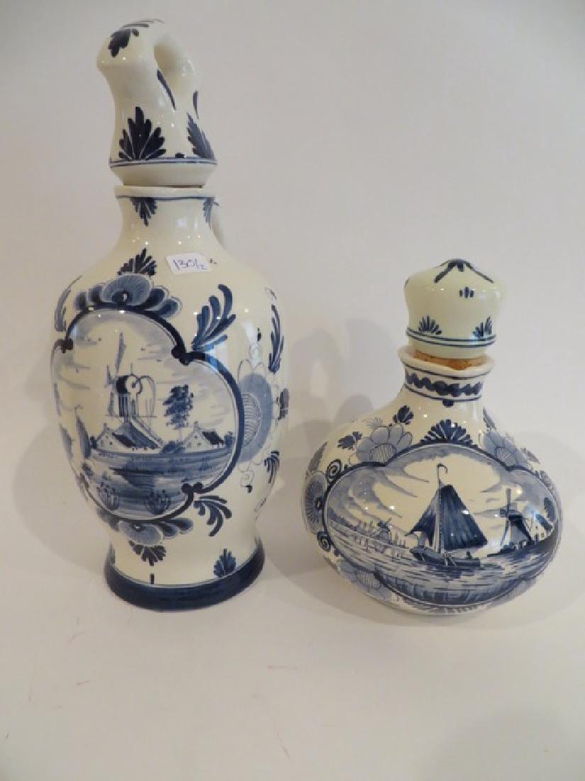Delft Decanters (2): One marked Ervem. Lucas. Bols Anno. 1575 Amsterdam, Holland Delfts and the second marked. In the same way. 12"H. and 8"H.