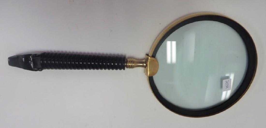 Monumental Magnifying Glass: Black soapstone animal form handle. 13"L. x 6"W