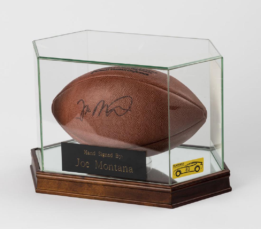 Joe Montana Signed Football: Football hand signed by the incredible Joe Montana, one of the greatest athletes of the 20th century. This football bears the hand of one of the most important players ever to grace the field, sometim