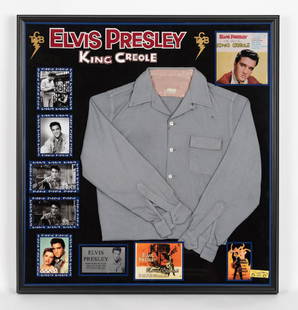 Elvis Presley's King Creole Shirt: This is the original gray wool shirt worn in the production of the 1958 film "King Creole," featuring Elvis Presley. It bears a vintage Paramount Studios shirt label with the name "E. Presley." Comes