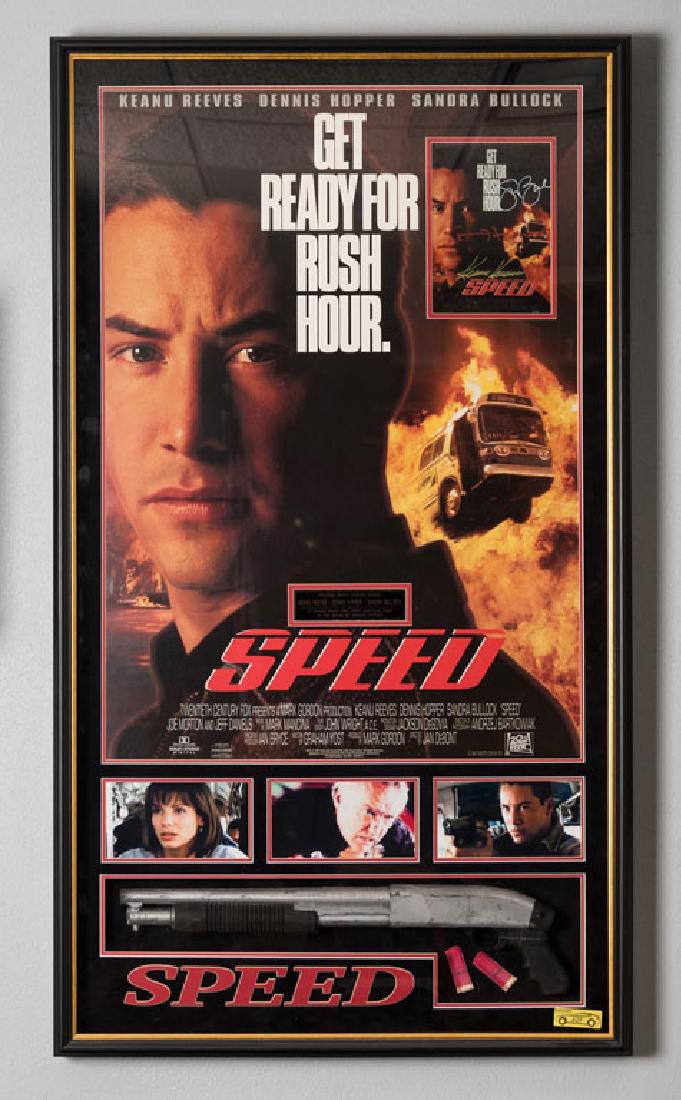 Signed Speed Movie Poster and Prop Gun: Speed movie poster signed by Keanu Reeves, Dennis Hopper, and Sandra Bullock. Framed in shadow box display with prop gun screen-used by Dennis Hopper as the villainous Howard Payne. COA from movie pro