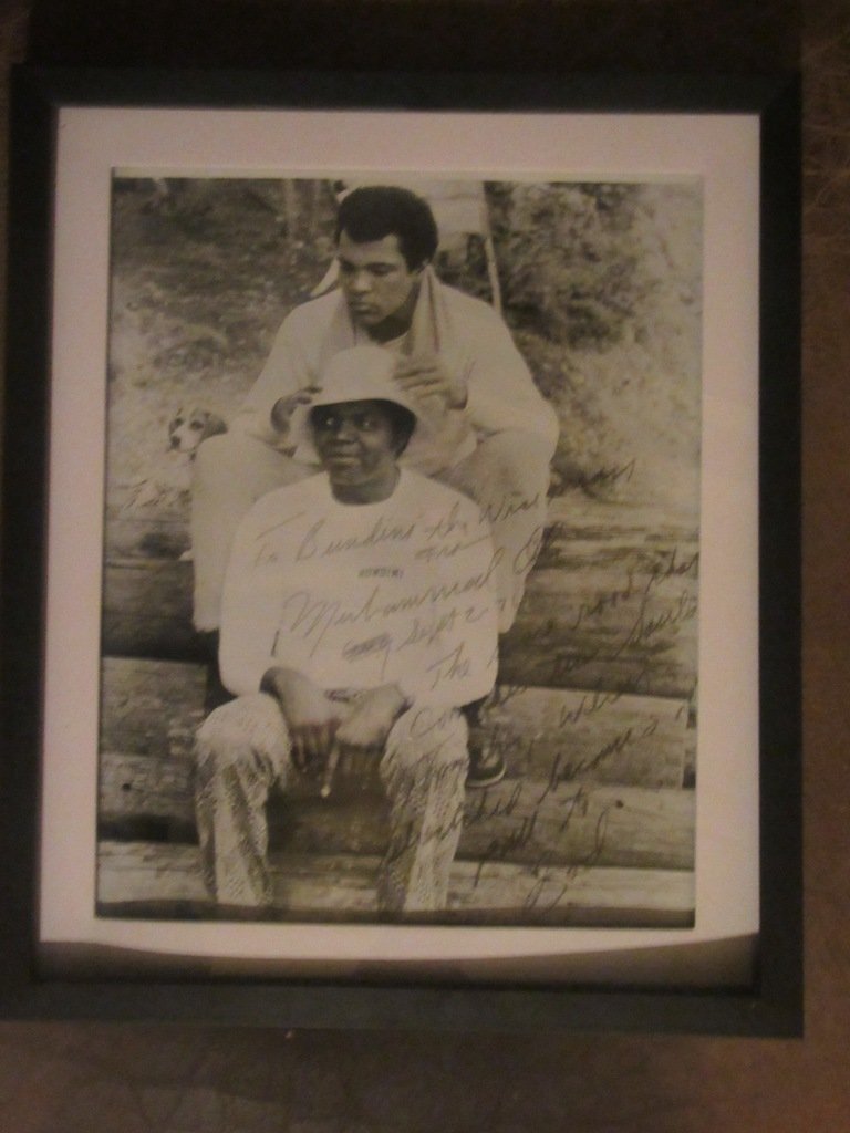 Muhammed Ali Bundini Photograph: Photograph of Muhammed Ali and Drew Bundini Brown. Original inscription was To Bundini, Wiseman from Muhammed Ali Sept. 2, 1976 The Same Road That Completes the Souls Together When Stretched Becomes a