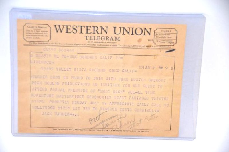 Liberace Western Union Telegram: Sent on June 21, 1956 to Liberace from Jack Warner, head of Warner Bros. " Warner Bros. is proud to join with Peck Moulin Productions in inviting you and a guest to premier of Moby Dick" Jack Warner.