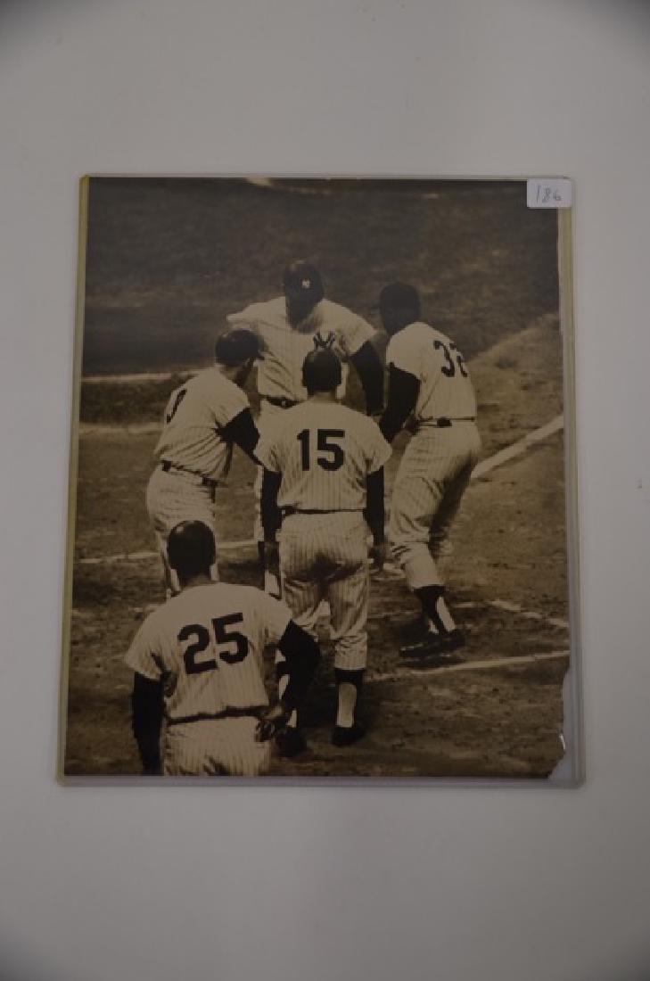 Mickey Mantle Tieing Ruth's Record: Photograph. 1963 Final Game in the World Series. Hit against Sandy Koufax with an enclosed newspaper clipping explaining the details. 8 x 10