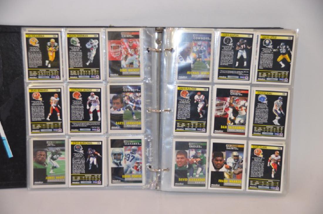 NFL Pinnacle & NHL Parkhurst Cards (650): Approximately 650 NFL Pinnacle and NHL Parkhurst sports cards. The lot includes U.S. Olympic Hall of Fame Cards and 1991 /rookie cards as well as NFL Wild Cards, all in a binder. NFL teams inc. Bears,