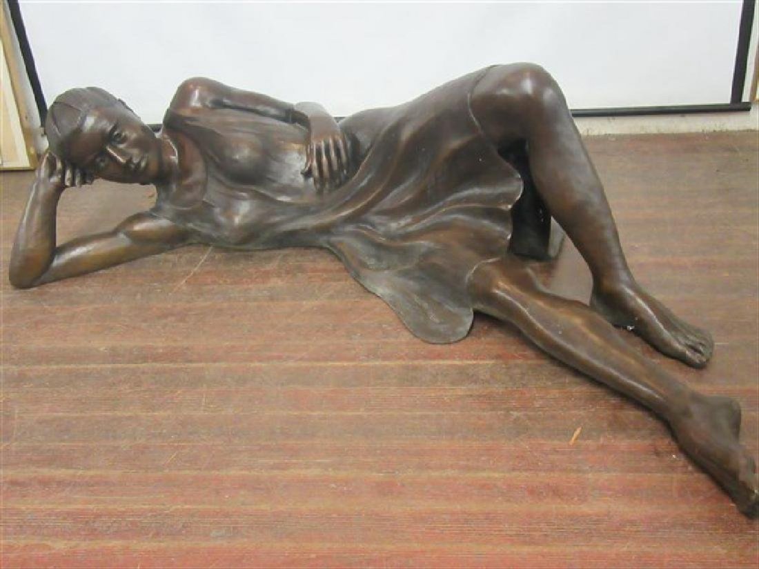Gordon Dunn. Life Size Bronze. Girl: Life size bronze of a reclining young woman. Chocolate brown patina. Signed Dunn.Ê 59" L.