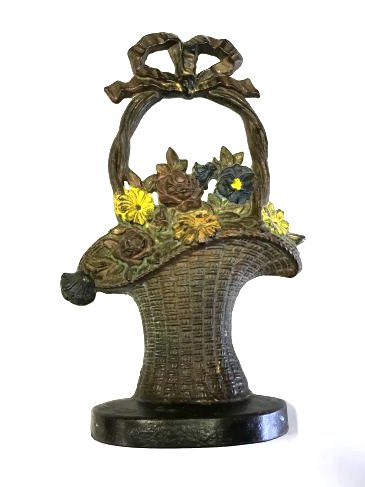 Cast Iron Doorstop. Basket of Flowers: Antique cast iron doorstop, a basket of flowers, 12"H.