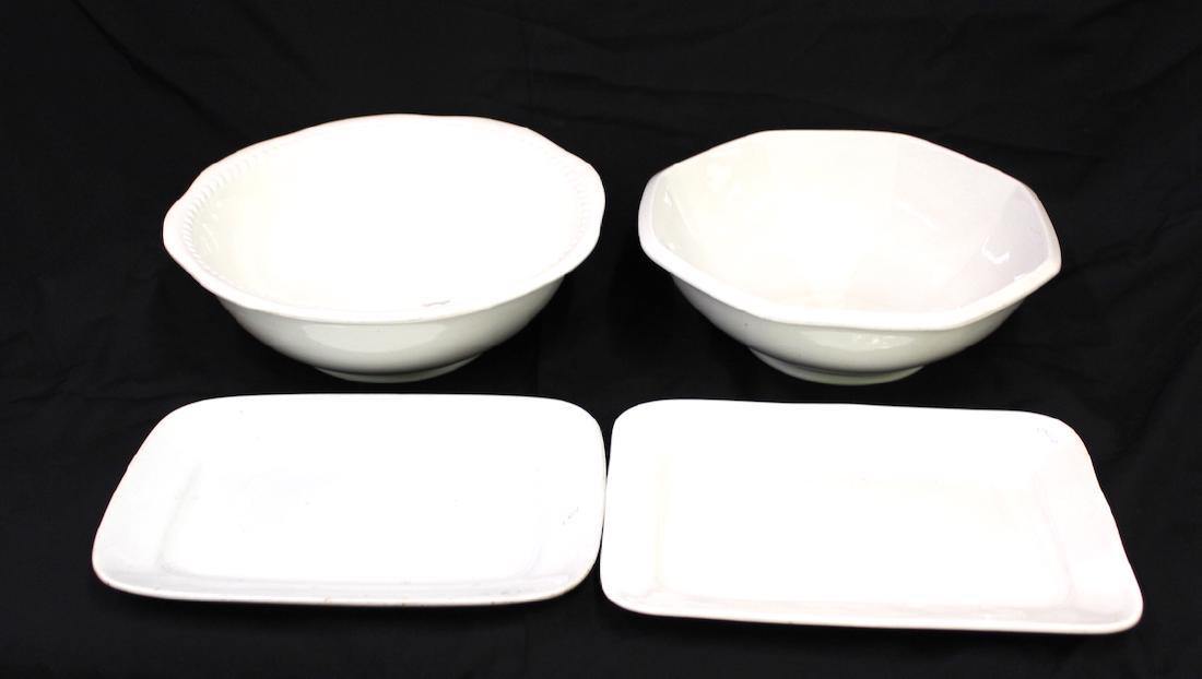 Estate Lot Ironstone Platters & Washbowls: Four items in the lot. One Washbowl and one platter marked John Maddock & Sons; one bowl marked Parisian Porcelain, Henry Alcock & Co,England and one platter unmarked. Platters are 14"L and Bowls are 
