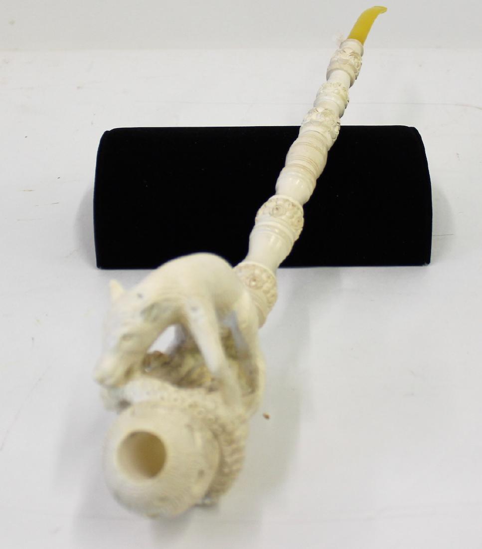 Bone Carved Figural Pipe. Bakelite Mouthpiece.: Boar with a snake. 20"L