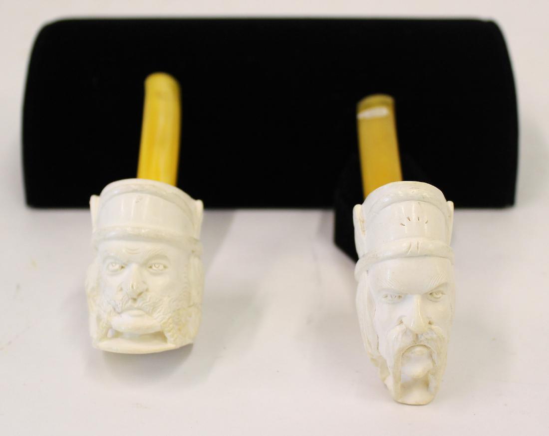 Bone Carved Figural Pipes. Bakelite Handles (2): Two Men. Bakelite mouthpieces. Two in the lot. 6"L.