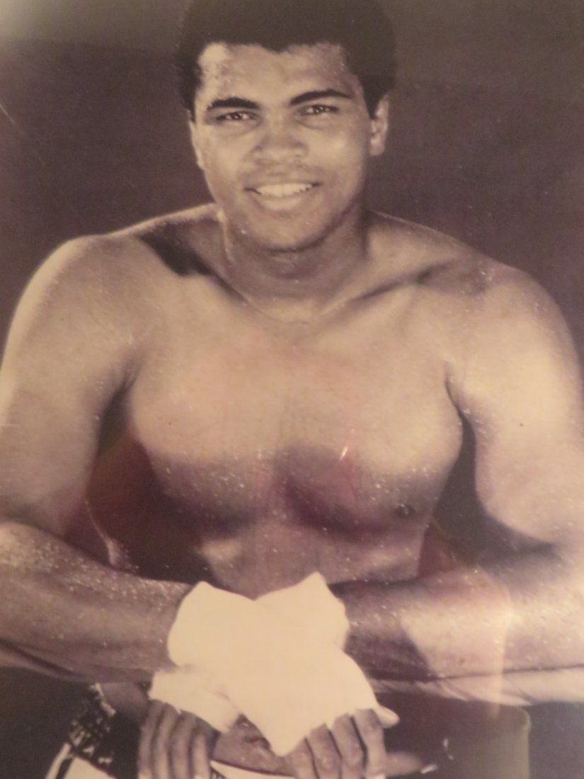 Muhammad Ali Ringside Photograph: Framed B&W Photograph of Muhammad Ali posing at ringside.