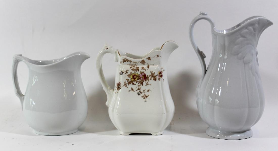 Collector's Lot of Ironstone Pitchers (3): Ironstone pitchers, three in the lot, one floral decorated with marks for Henry Alcock, Cobridge, England; one a large ironstone pitcher with bas relief highlights , unmarked and the third, Royal Bone