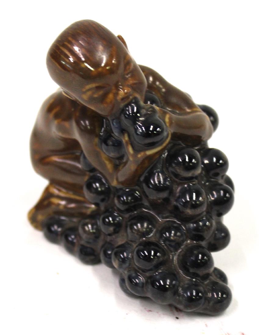 Bing & Grondahl Kai Nielsen (1882-1924) Figure: Bing & Grondahl Kai Nielsen (1882-1924) Figure of a boy with a bunch of grapes