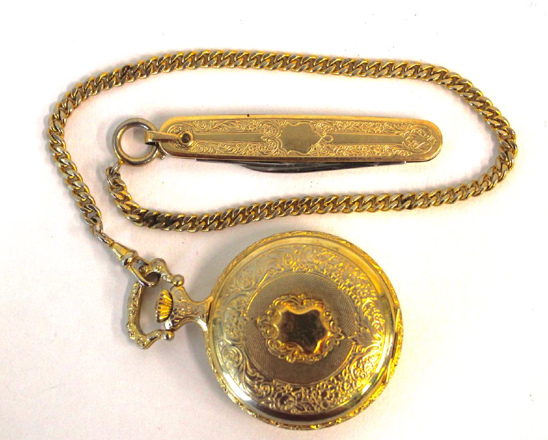 Colibri 17 Jewel Swiss Hunting Case Watch: Marked Colibri and 17 Jewel on the face. With a gold filled chain and pocket knife.