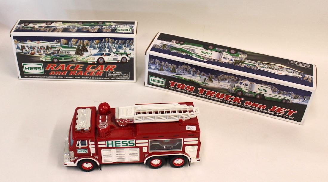Collectible Hess Trucks (3): 2005 firetruck without a box. Also 2009 and 2010. Three in the lot
