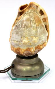 Seashell Nite Lamp. Souvenir of Genoa: Carved Seashell. Souvenir of Genoa On a glass stand. 6"H.