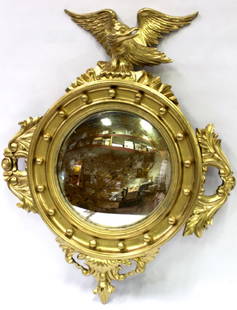 Gilt Framed Carved Mirror in the Federal Style: Eagle surmount. Giltwood mirror with good detailing. 36"H. x 28"W.