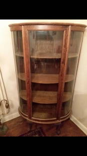 Turn of the Century Oak China Closet: Glass front. Raised on paw feet. Three wooden shelves. 59.5"H X 36"W X 15.5"D