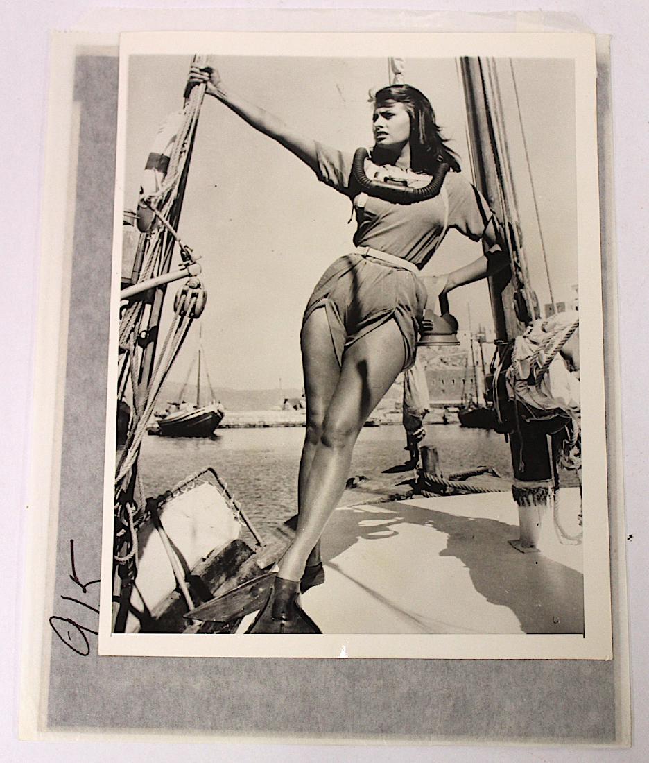 Sophia Loren Photograph. C.1957. With negative.: For Bagona Dolphin. Back stamp for International News Photos. With negative. 8 x 10