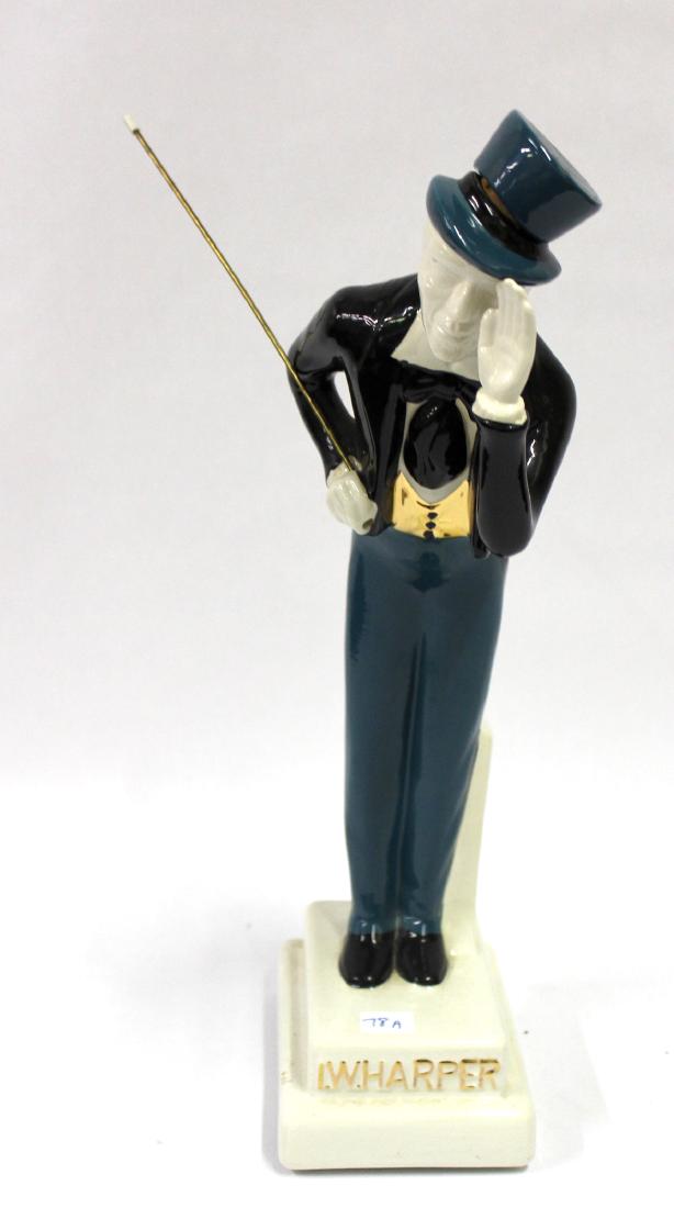 I. W. Harper Figural Bourbon Decanter: Bon vivant gentleman in a top hat. With cane.ÊBourbon whiskey decanter. 17"H.Ê