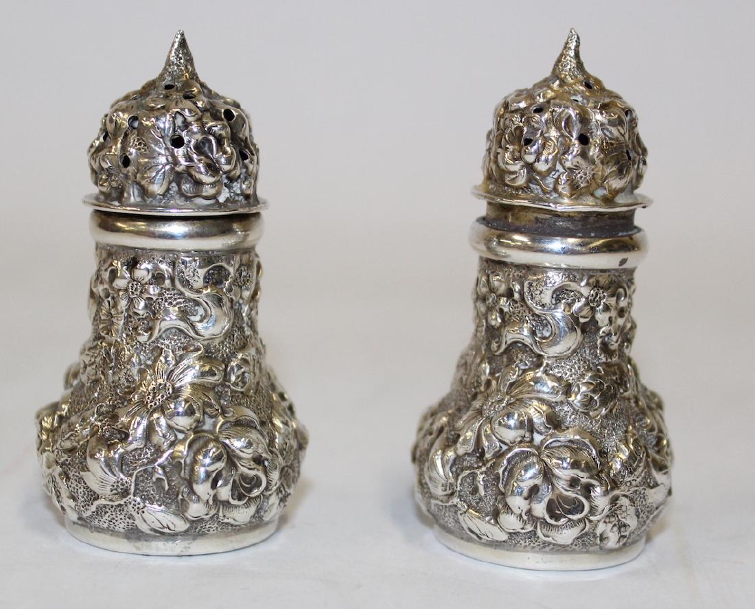 Steiff Sterling Silver Salt and Peppers: Very ornate and repoussed. Marked Steiff. 2 troy ounces. 2 1/2"H.