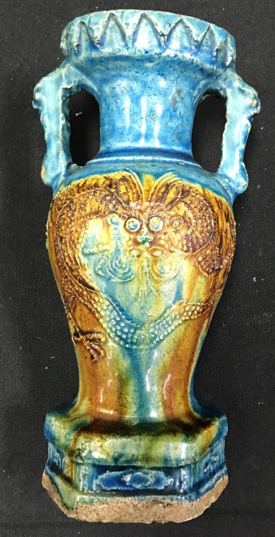 Yuan Glazed Pottry Vase. C. 1400: The Mongolian reign of the Yuan from 1279-1368, brought about new styles and types, this a good example. Superb condition in a brilliant turquoise glaze, with six sided base, a vase of bronze form, wi