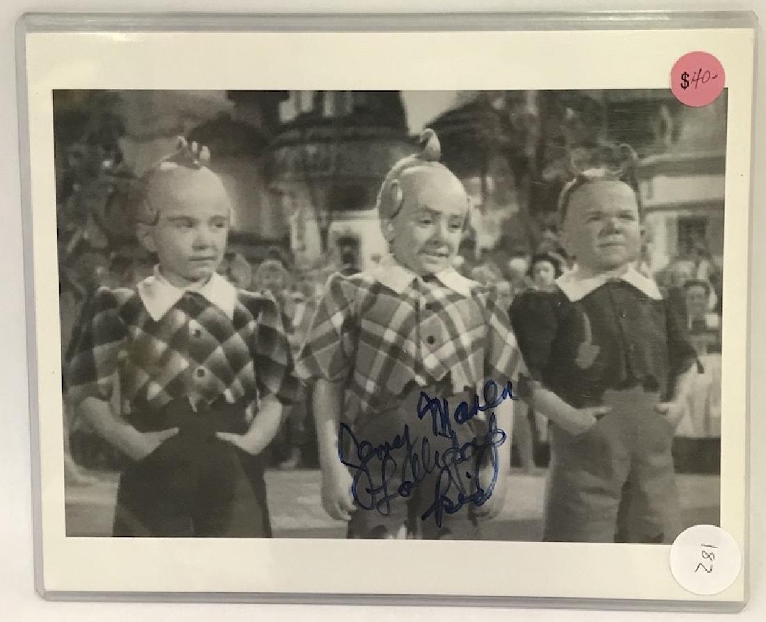 Wizard of Oz Munchkin Photo Sgd. Jerry Maren: Signed in ink Jerry Maren Lollipop Kid. Pictured with Harry Doll and Jackie Gerlich, Jerry Maren is the one who handed Judy Garland the lollipop, thus the description. 8 x 10