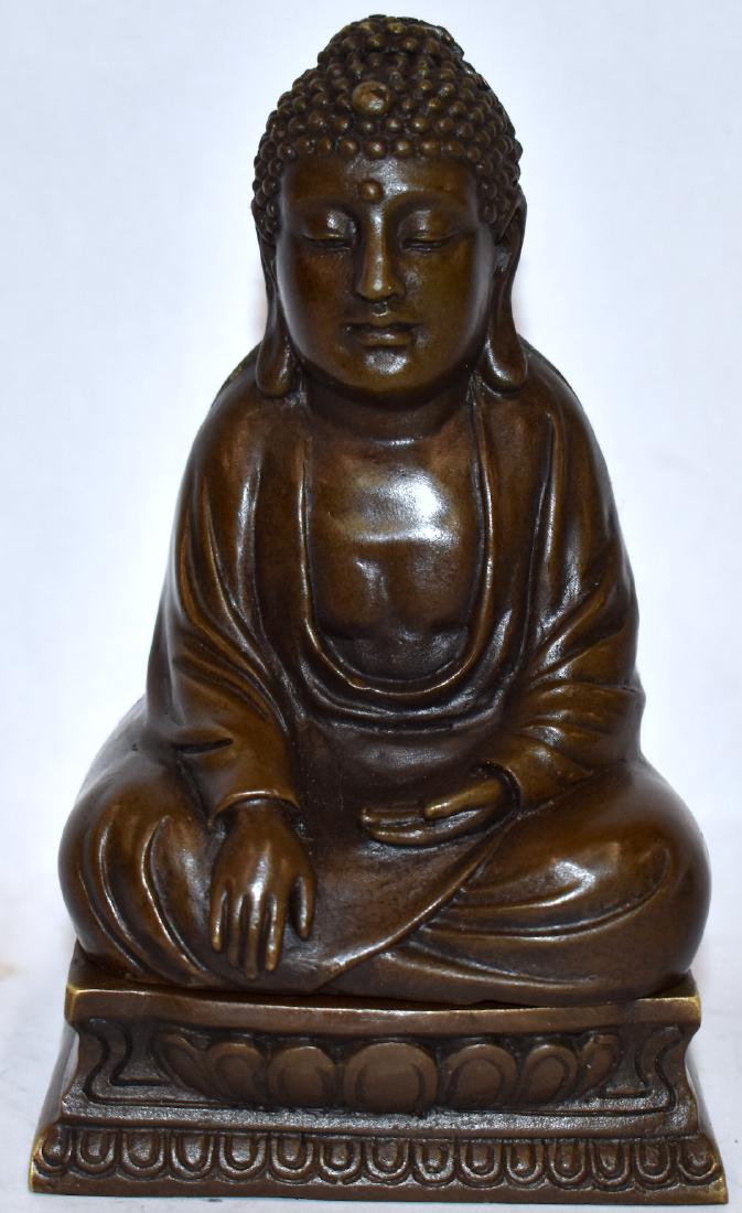 Bronze. Elder. Opens to Reveal Nude: Unusual bronze of a buddha. Front is removeable and reveals a contemplative nude in a yoga like position. Well detailed with inside decorations to the frontispiece at the inside when it is removed. 6"