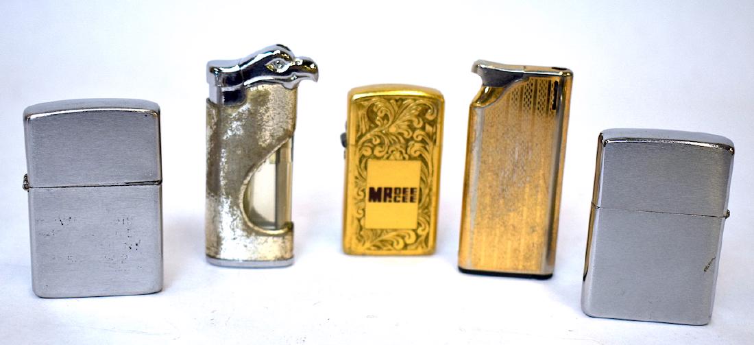 Collectible Lighters. Zippo. Park. Calibri. My-Lite (5): Five collectible lighters in the lot. Zippo chrome; Park filigreed "gold" Murfreesboro, Tenn; Calibri "gold" striped; My-Lite, all marked and a figural eagle head lighter, case finish worn. Five light