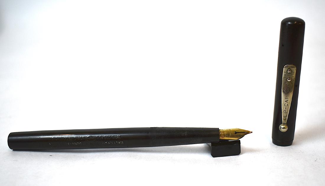 Early Waterman Ideal Fountain Pen NY 1884: Marked Clip Cap. Pat. Sept. 26 05 on the top clip. Marked Waterman Ideal NY on the outside of the bottom of the pen as well as Pat. Feb. and Nov. 1884 . Marked Waterman Ideal NY on the nib.