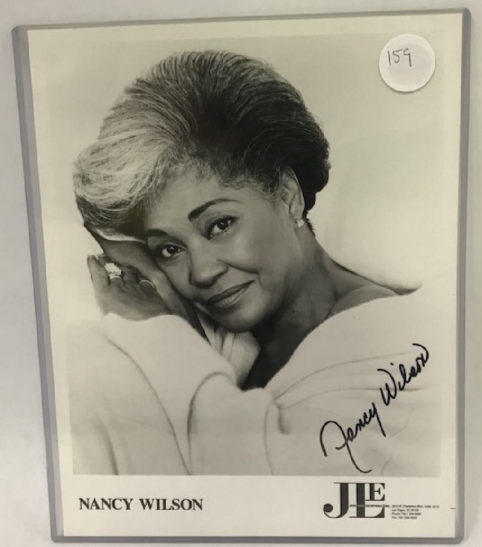 Autographed Nancy Wilson Photograph: John Levy Enterprises publicity photo sgd. in soft black felt tip marker. 8 x 10