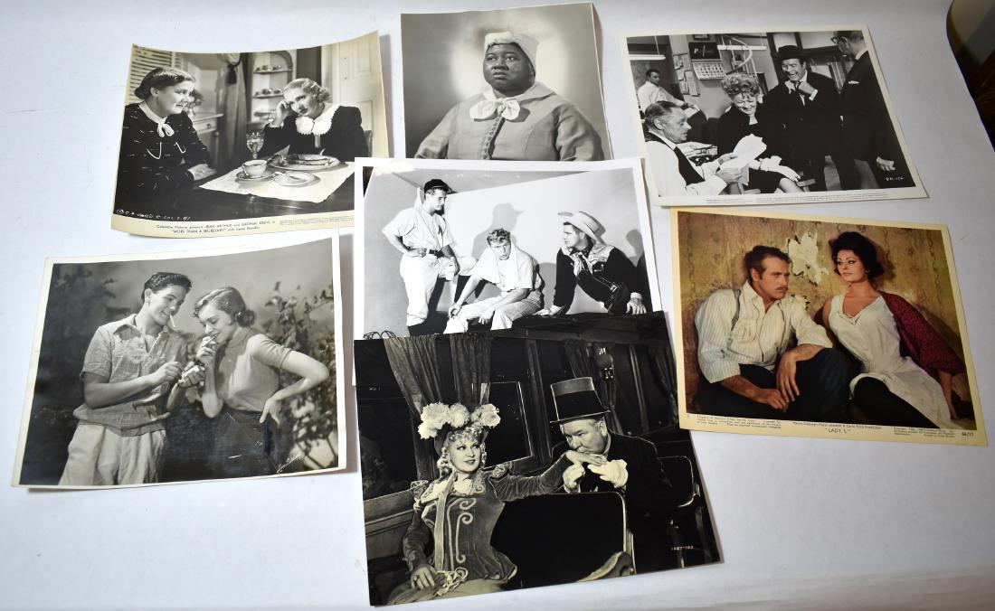 Movie Stills inc. Jean Arthur; Mae West, Garfield (7): Columbia, Jean Arthur in More Than a Secretary, 1941; Paul Neuman in baseball attire in a dugout; Paul Neuman and Sophia Loren (color) for Lady L, MGM; Mae West and W. C. Fields (cardboard stock); Luc