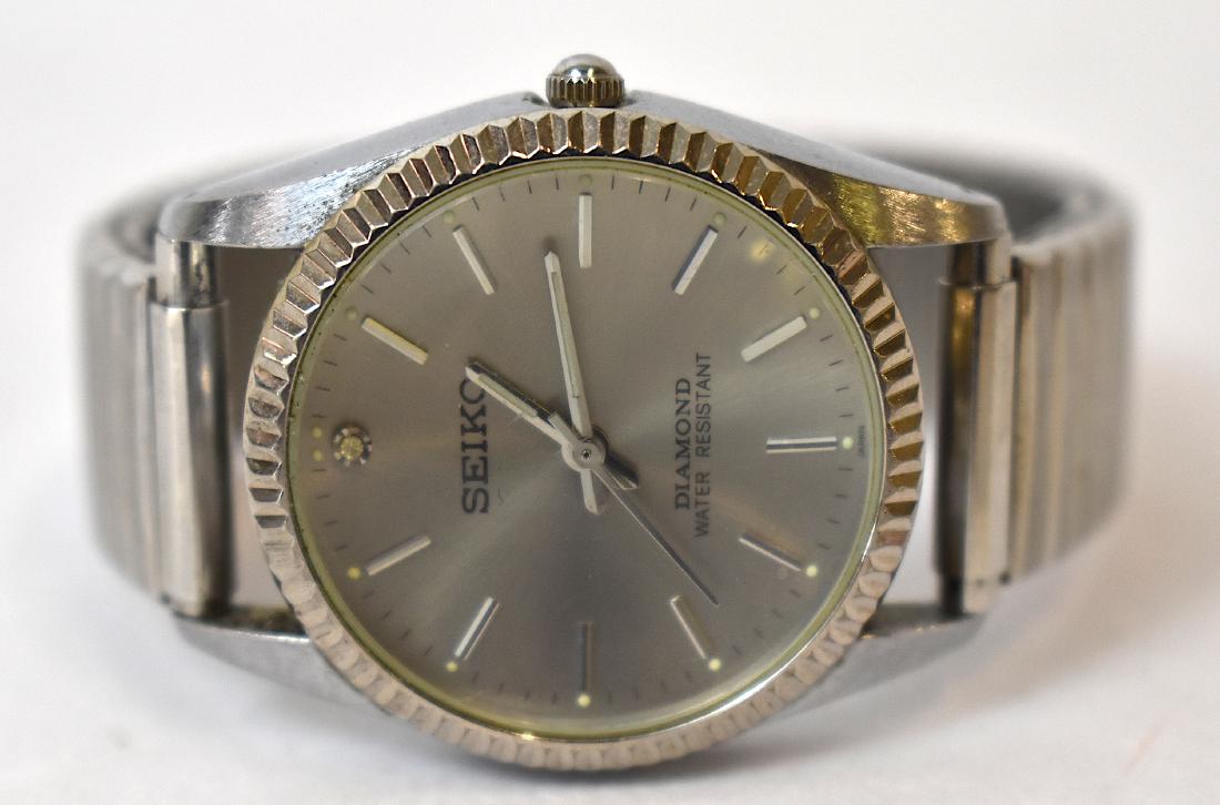 Seiko Diamond Water Resistant Wrist Watch: Marked Seiko and Diamond and Water Resistant on the dial. Stainless Steel. Case