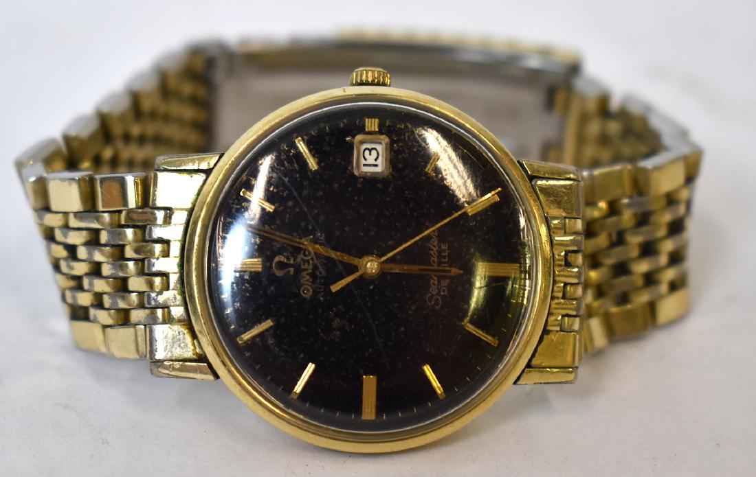 Omega Man's Automatic Seamaster Deville Watch: 14K Gold Filled Man's Wrist Watch. Both Watch and Bracelet are 14k Gold Filled. In Working Condition