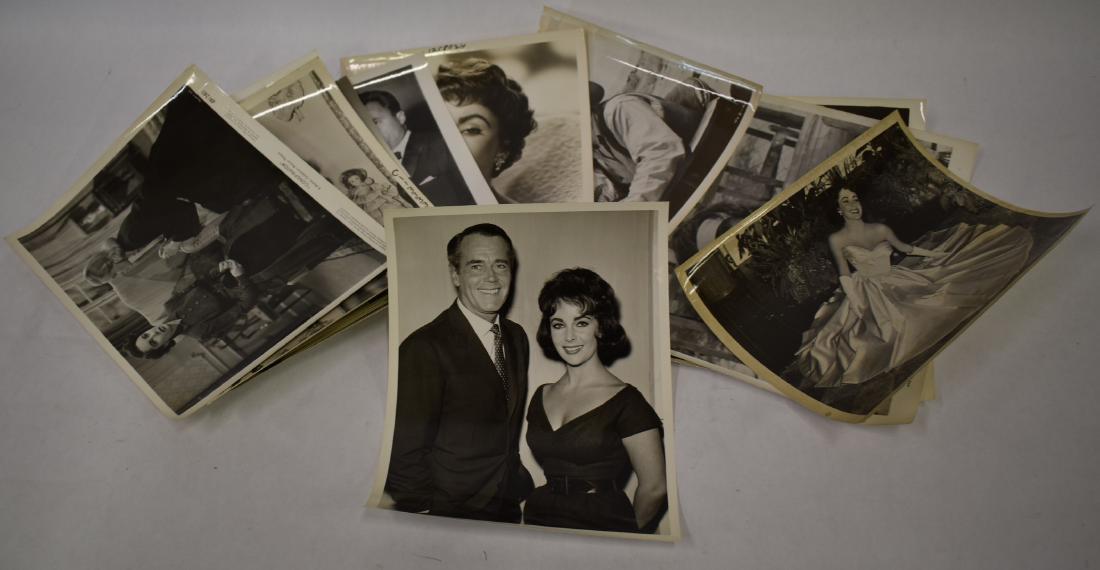 Elizabeth Taylor Photographs and Negatives (11): With Montgomery Clift; as a teenager in Western garb; with her dolls; in Conspirator; with Henry Fonda (back stamp for Frank Carroll photo; 1959 Columbia Pictures publicity photos about 1959 (2); in a