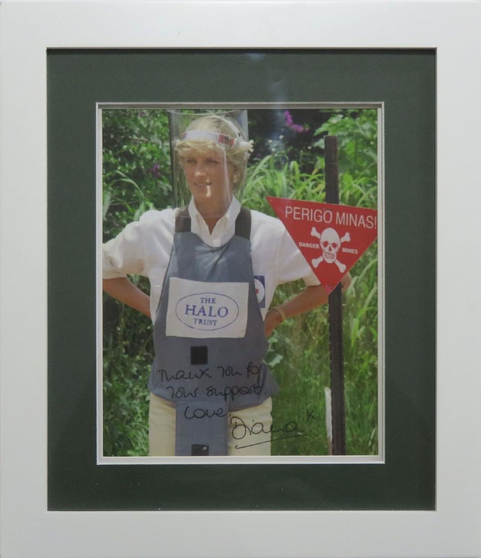 Princess Diana Red Cross Halo Trust Signed Photograph: This support photograph is considered one of the last photographs that were signed by Princess Diana for her charity work as she passed away soon after this last charity visit. The photograph is signe