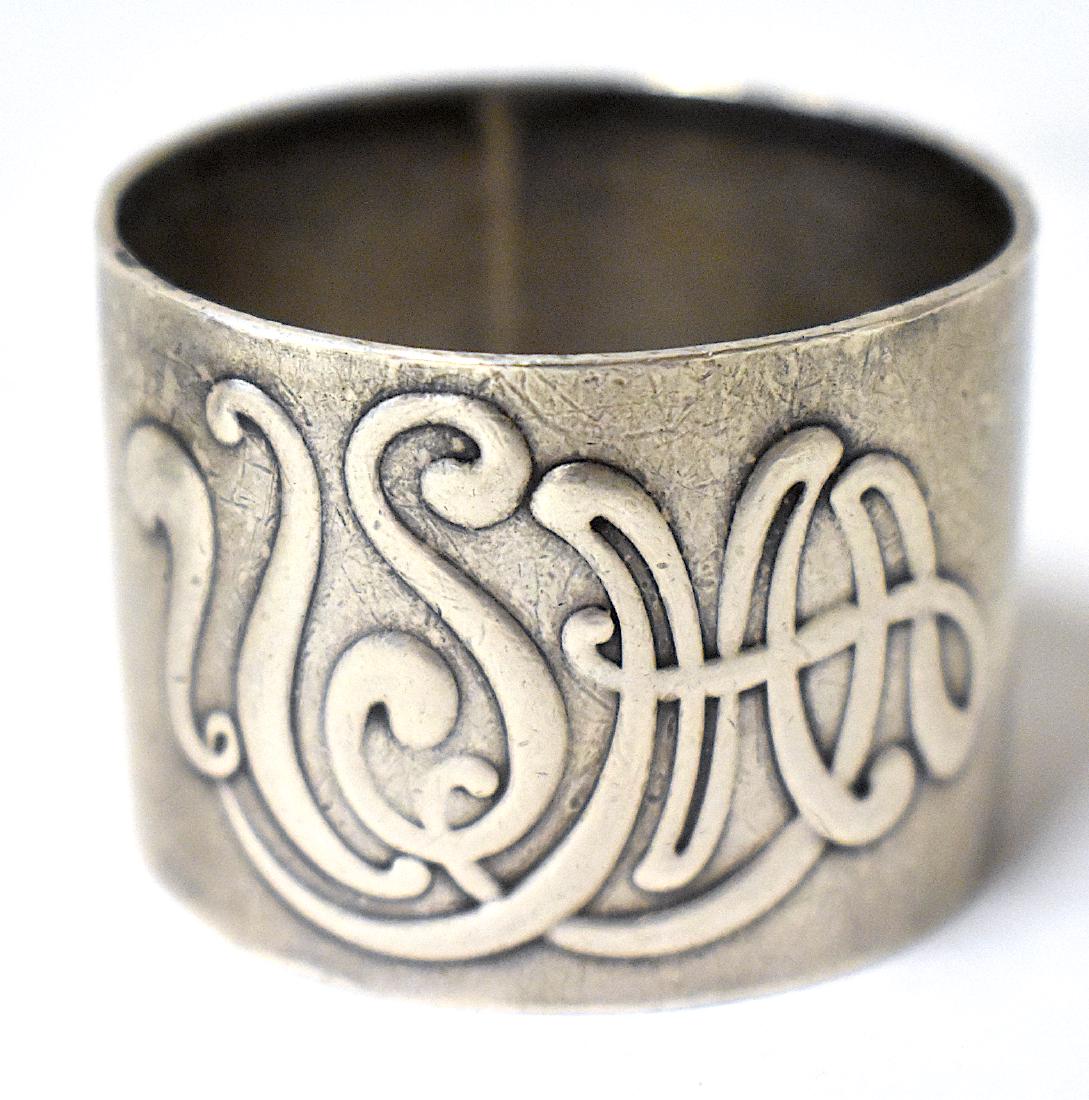 Sterling Silver USMA Napkin Ring . C. 1919: Vintage sterling silver United States Military Academy at West Point napkin ring. Decorated with Art Nouveau like letters USMA. Engraved inscription Eric Spencer Molitor Class of 1919 at the inside of