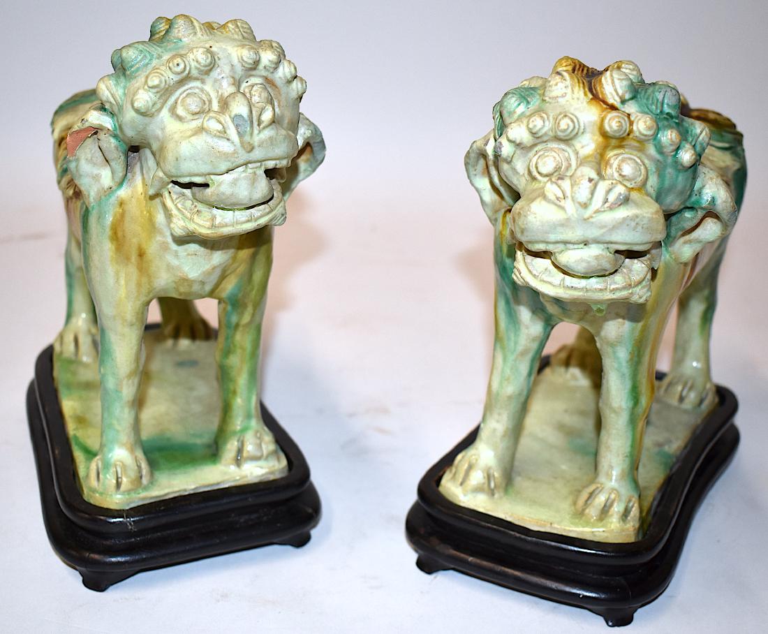 Pr. Early Ming Multi-Glazed Ceramic Lions: Once called Tang by old Parke Bernet Galleries it is likely these are fairly early Ming and even possibly from 18th C. Multi glazed pottery lions high fired buff pottery pr with streaked glazing of Ca