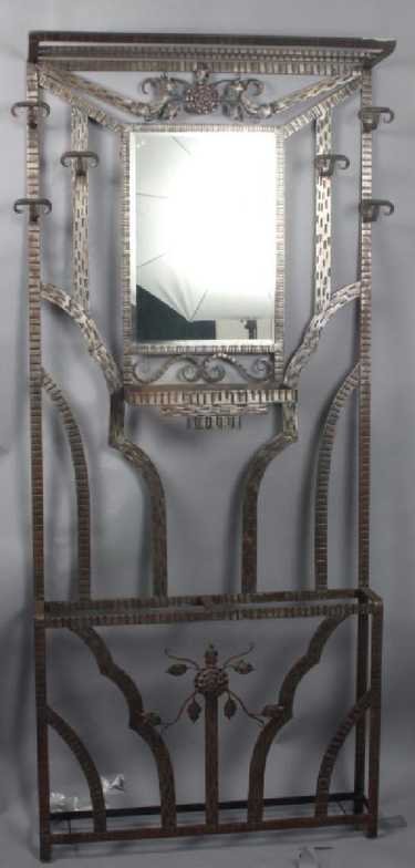Edgar Brandt (In the Manner Of) Art Deco Hall Tree: Art Deco hand wrought iron mirrored hall tree in the manner of Edgar Brandt. 72"H. x 31.5"W.