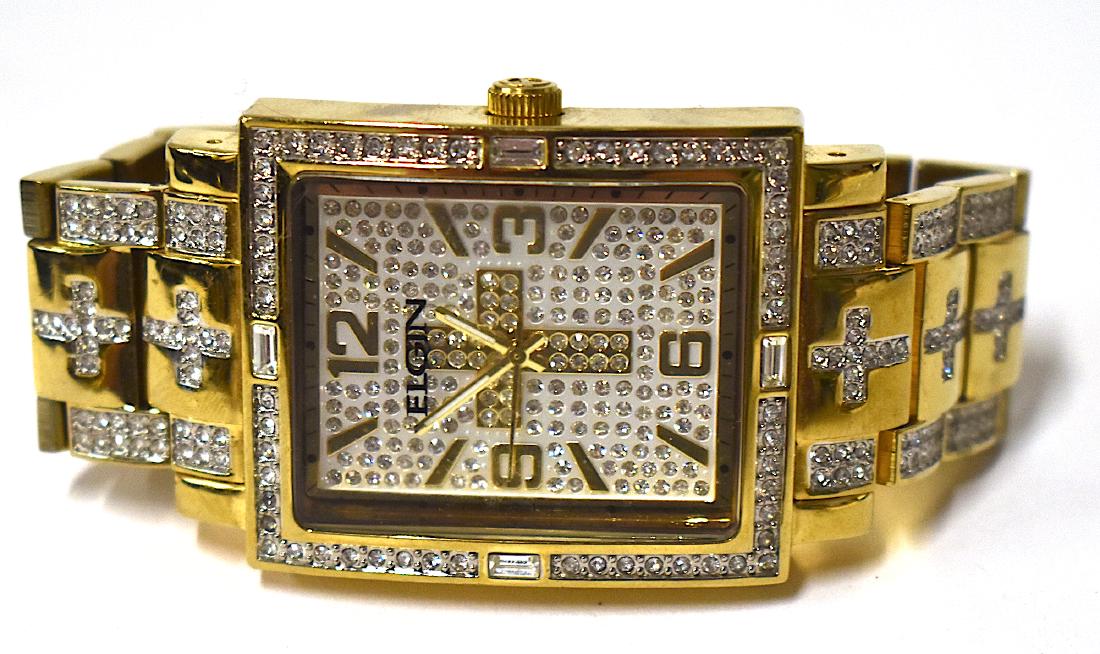 Fancy Elgin Wristwatch with Cross at Center: Unusual marcasite adorned watch band interspersed with gold plate and a marcasite surround to the dial also decorated with marcasites having a cross at the center.