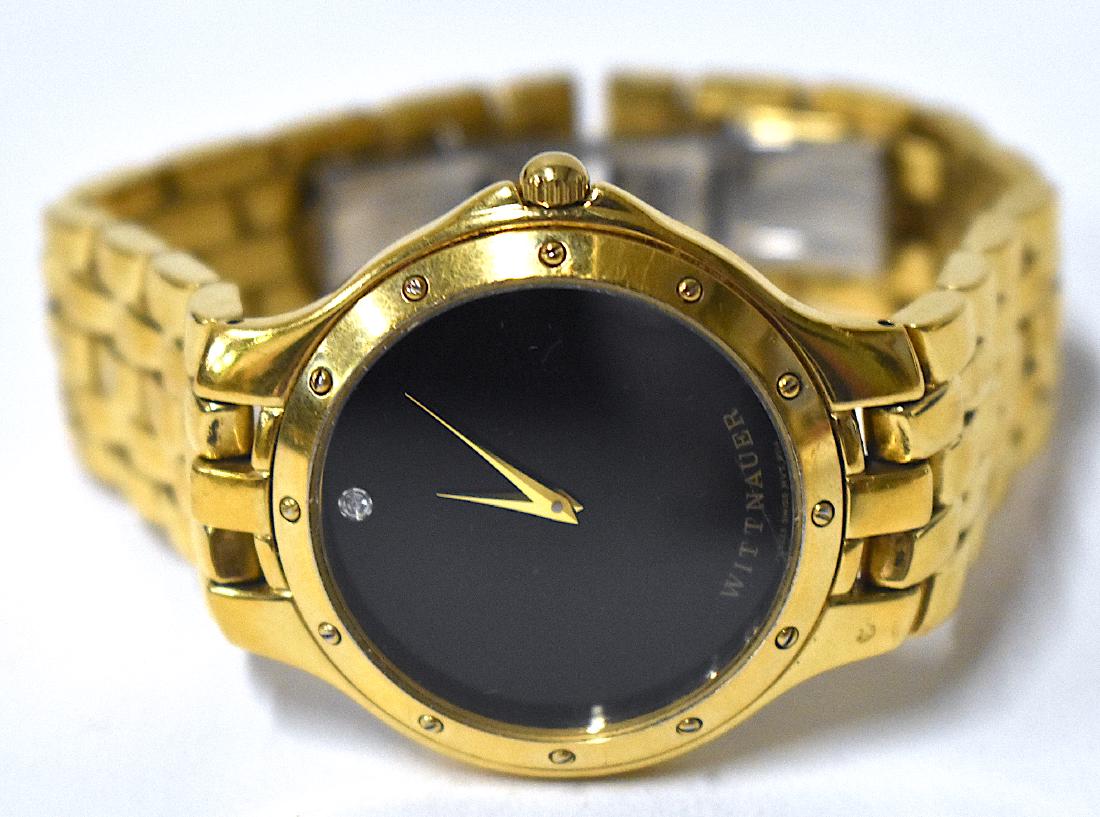Wittnauer Wrist Watch. Gold Toned Band: Black dial. Marked Wittnauer.