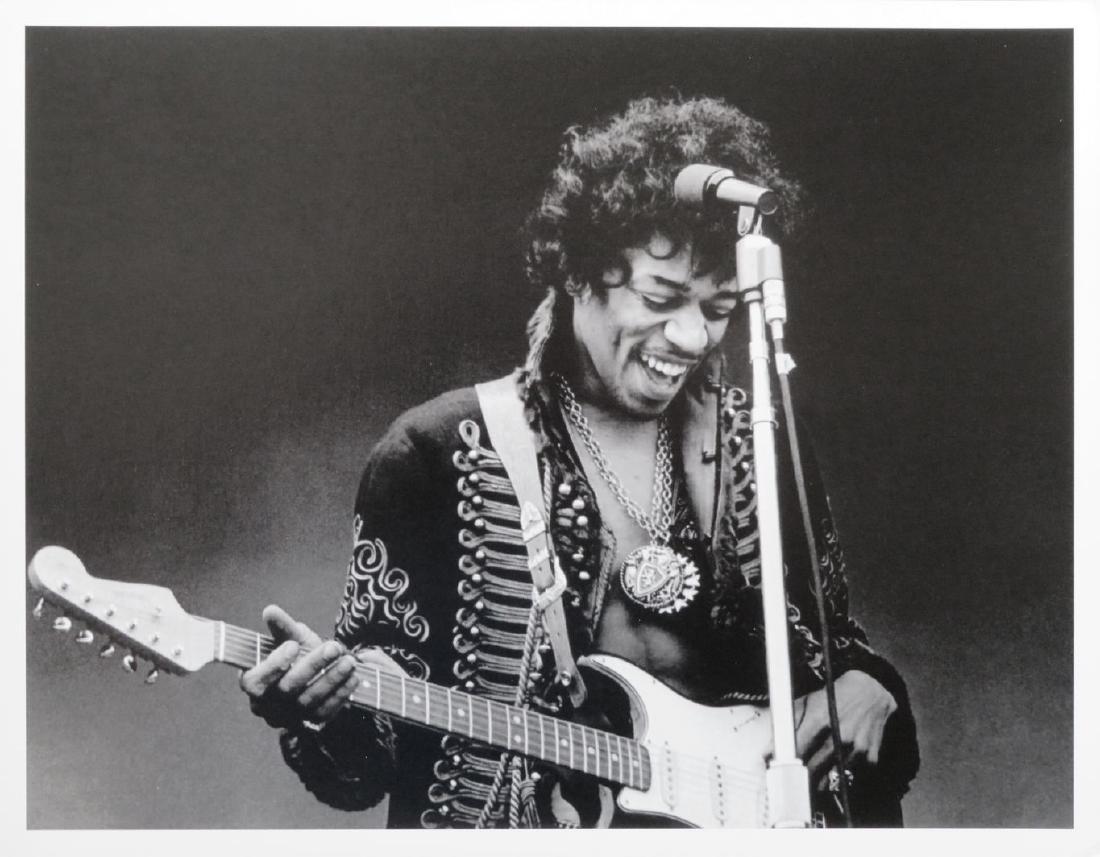 Jimi Hendrix Monterey Jim Marshall Photo: This iconic photograph of Jimi Hendrix measures 8" x 10" showing the greatest guitarist in the world during a sound check at Monterey. The photograph was printed in late 1970's. Photograph taken in 19