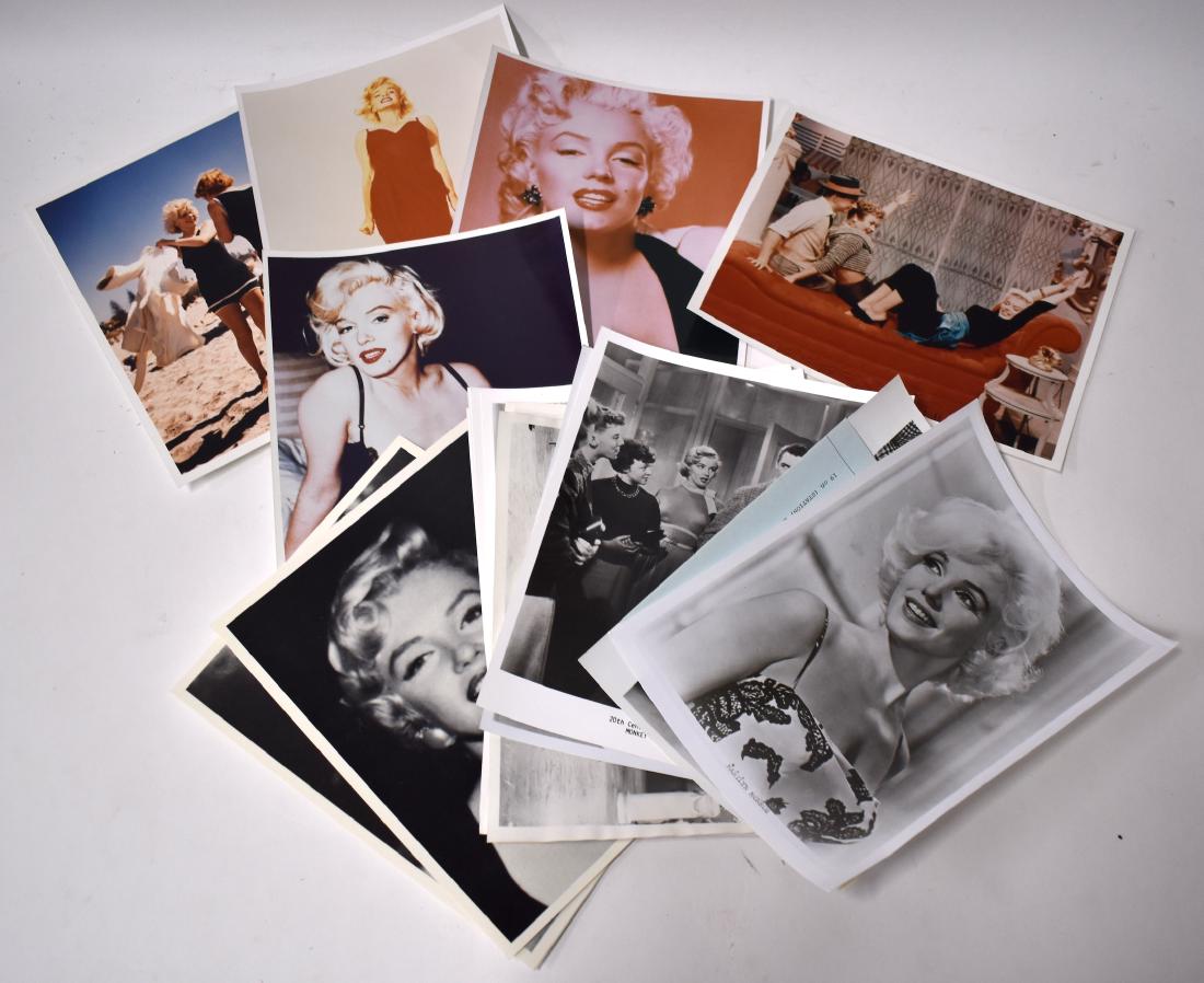 Marilyn Monroe Photographs. B & W & Color (18): Thirteen black and white inc. two from Bus Stop, one portrait sided with Groucho Marx with a publicity snipe; several glamour portraits inc. two on cardboard stock and five color photographs in the lo