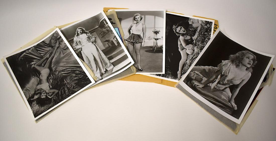 Glamour Girl Photos and Negatives. (10): Lot includes Virginia Mayo photograph and negative from which it was made .; glamourous Dorothy Lamour (negative). Hedy Lamarr photo and negative from which it was made; Rita Hayworth bathing suit pho