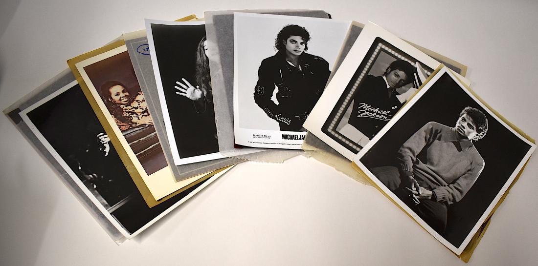 Micheal Jackson. Janis Joplin Photos & Negs (12): Micheal Jackson Photographs and Negatives inc. an early "before" surgery portrait; a portrait in nautical gear; an Epic 1987 publicty portrait. (6). Janis Joplin singing onstage with the negative from