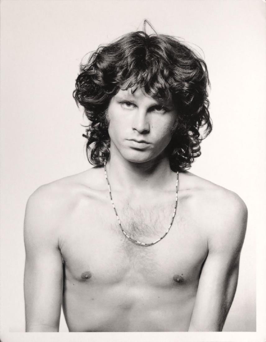 Jim Morrison Photograph by Joel Brodsky: A 12" x 16" photograph of the famous singer/songwriter Jim Morrison. The original photograph was taken by Joel Brodsky in 1967. This photograph was printed in late 70's. It comes with the photographer