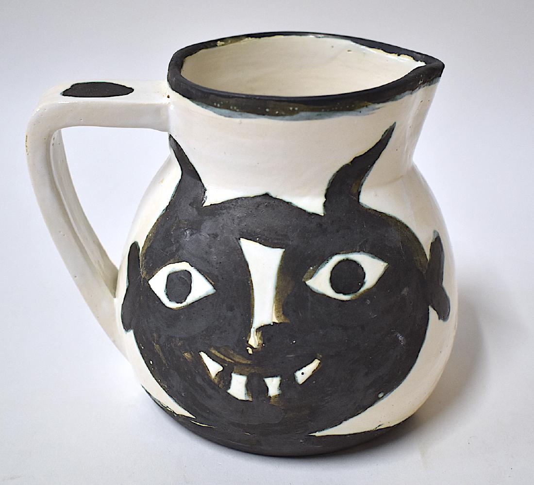 Picasso Pottery Pitcher: Marked boldly in black Edition Picasso and with impressed stamps one Madura and the second indiscernible. Size 5"H